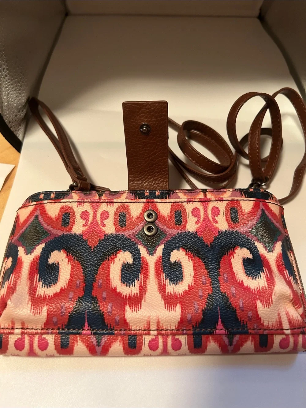The sak iris crossbody wallet boho ikat print festive black pink cream casual
